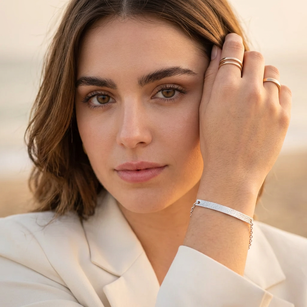 Model wearing polished sterling silver bar bracelet