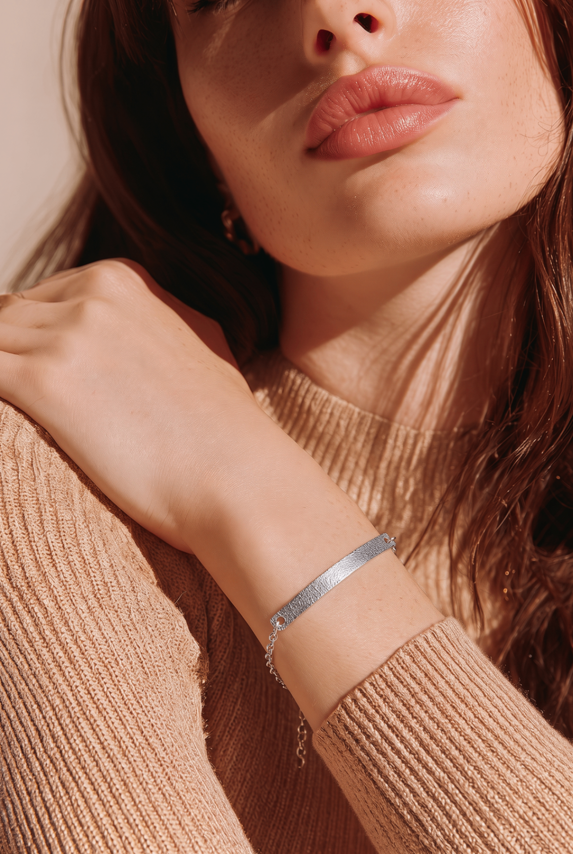 Model wearing sterling silver Signature Touch Bracelet